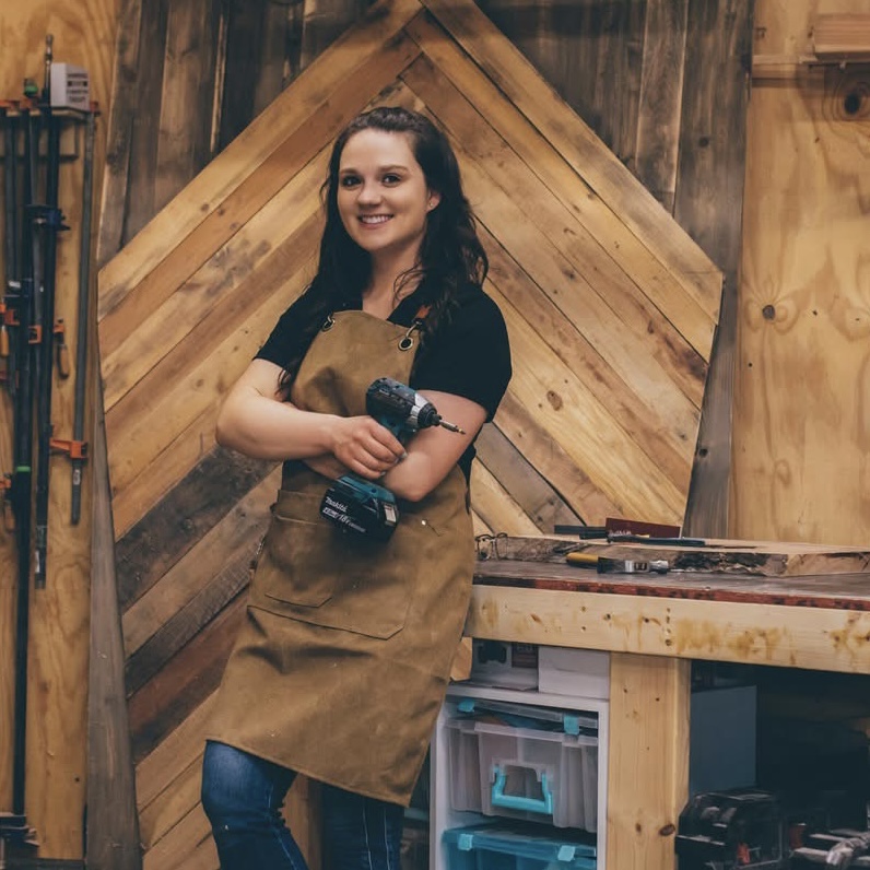 Brittany, the maker behind Rustic Carolina Creations, in her workshop